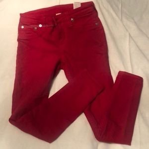 Red skinny low rise jeans